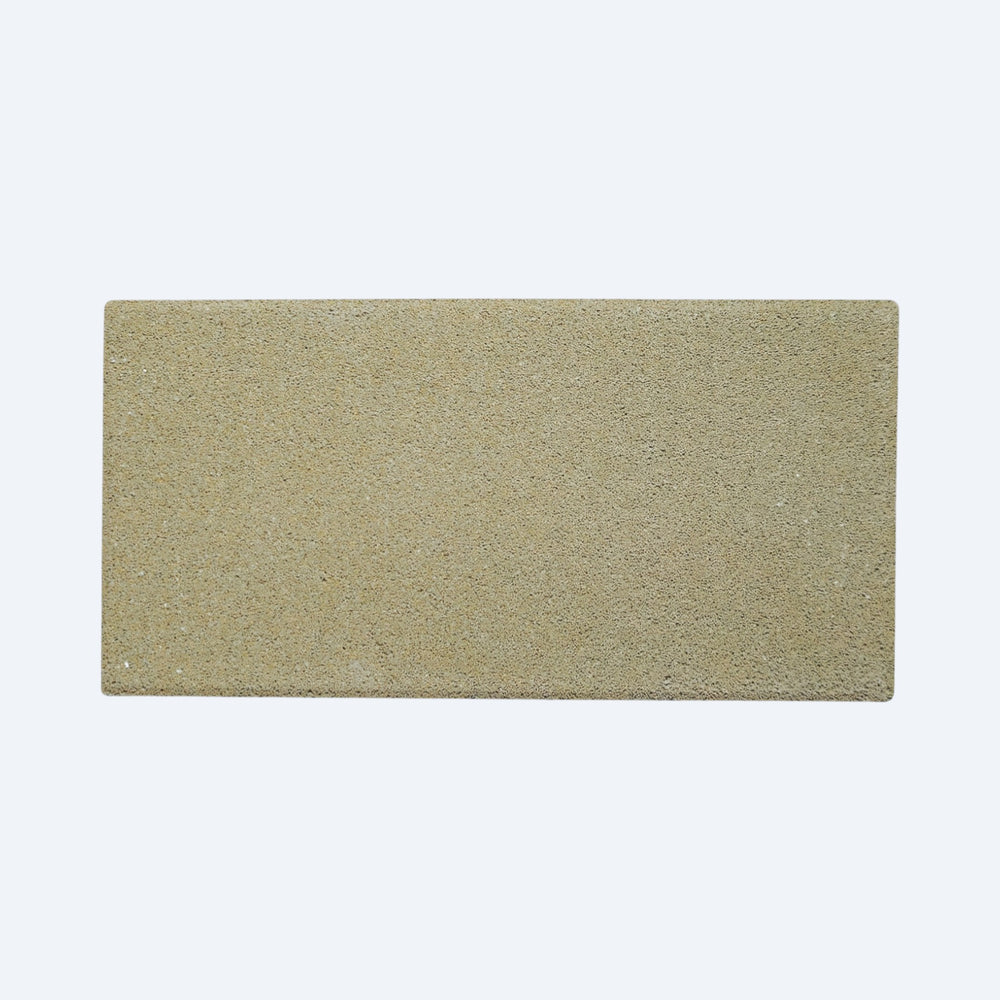 Rectangular beige tile on a white background